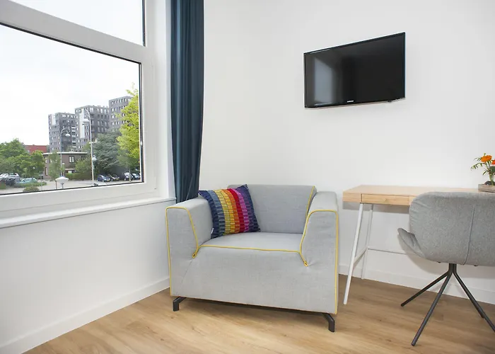 I Амстердам