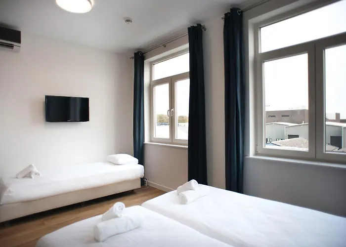 I Амстердам